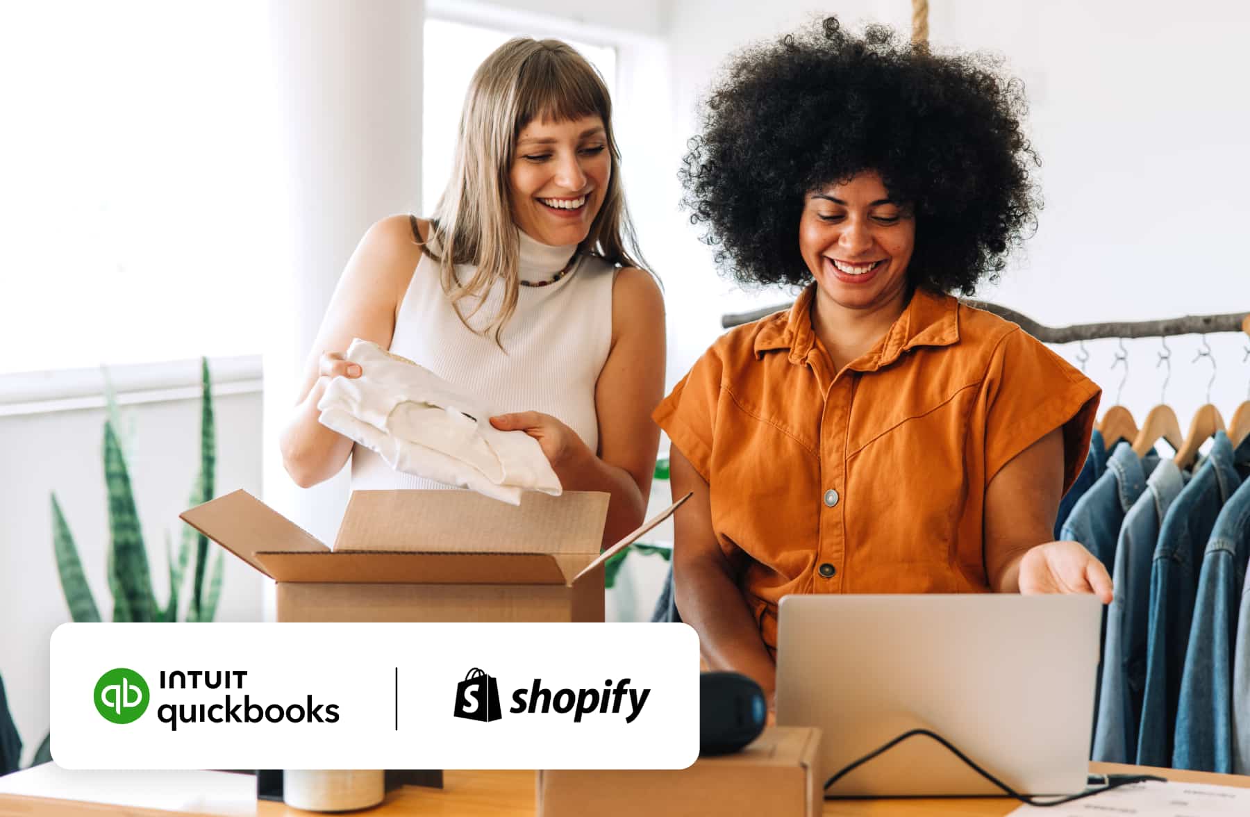 Two retail business owners packing an order, with the Intuit QuickBooks and Shopify logos